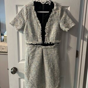 Like new. White with sparkly details. Perfect for work or a night event.